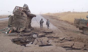 1024px-Buried_IED_blast_in_2007_in_Iraq